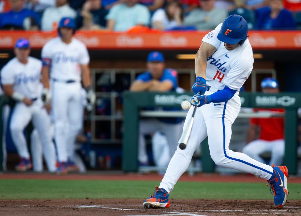 Florida's Jac Caglianone connects with a pitch, hitting a fly out, in the Gators' March 12 game against FSU.