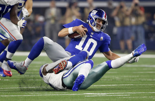 Eli Manning’s demise is hurting his teammates reach their fantasy star potential (AP Photo).