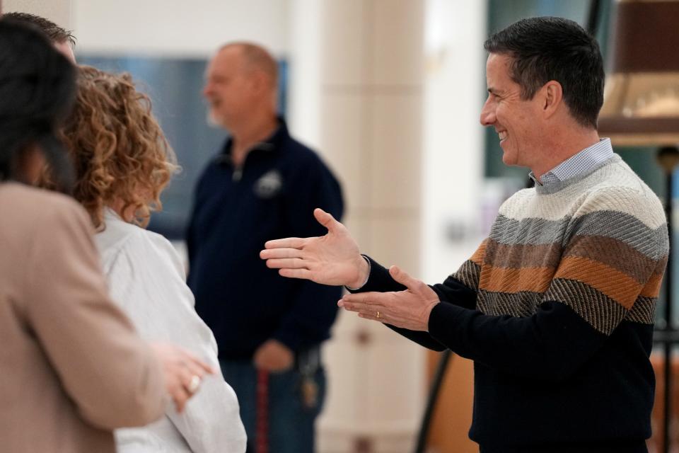 Bernie Moreno greets voters and candidates for other offices during a meeting of the Warren County GOP on Jan. 18.