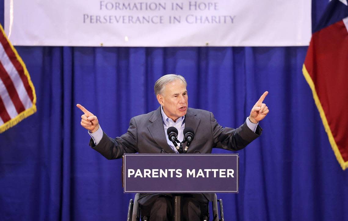 Gov. Greg Abbott speaks to students, parents and staff at Nolan Catholic High School while trying to build support for his school choice plan on Wednesday, April 19, 2023.