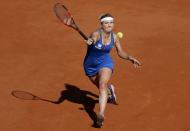 Timea Bacsinszky of Switzerland returns the ball to Serena Williams of the U.S. during their women's semi-final match at the French Open tennis tournament at the Roland Garros stadium in Paris, France, June 4, 2015. REUTERS/Vincent Kessler TPX IMAGES OF THE DAY