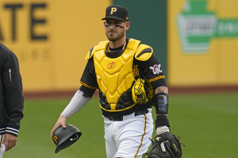 Pittsburgh Pirates catcher Yasmani Grandal walks from the bullpen after warming up starting pitcher Jared Jones before a baseball game against the Colorado Rockies in Pittsburgh, Saturday, May 4, 2024. (AP Photo/Gene J. Puskar)