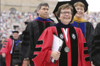 FILE - In this May 16, 2015 file photo, Chancellor Rebecca M. Blank, walks in a procession at the start of the University of Wisconsin-Madison spring commencement ceremony in Madison, Wis. A normal fall semester at the University of Wisconsin-Madison will depend on the pace of vaccinations for faculty, staff and students, Blank said Wednesday, March 3, 2021. (Amber Arnold/Wisconsin State Journal via AP, File)