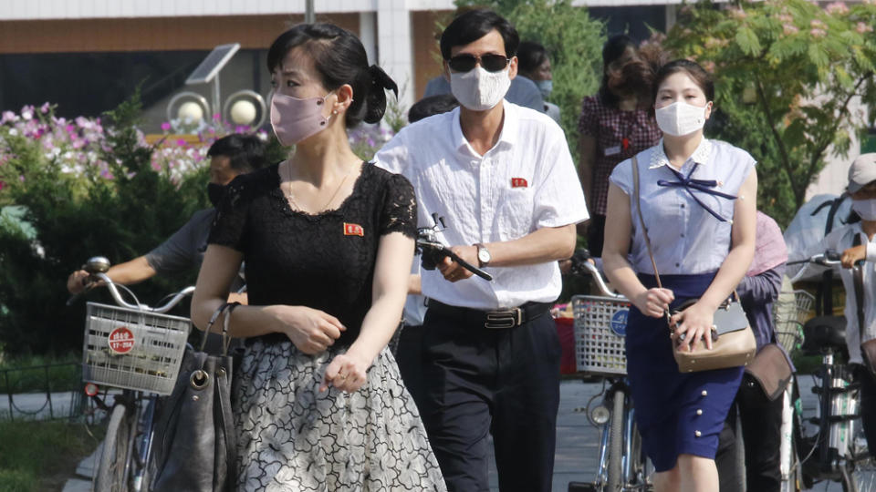 Pyongyang locals wearing face masks to prevent coronavirus.