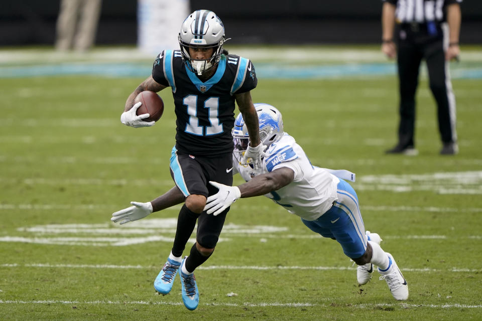 Carolina Panthers wide receiver Robby Anderson breaks away from Detroit Lions' Jayron Kearse during the second half of an NFL football game Sunday, Nov. 22, 2020, in Charlotte, N.C. (AP Photo/Brian Blanco)