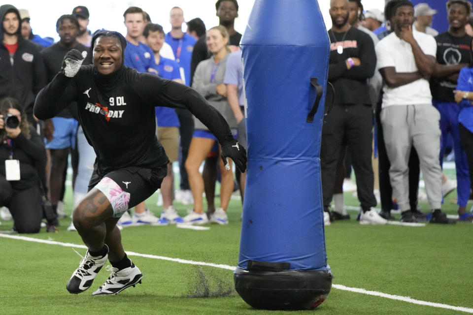 Florida defensive lineman Gervon Dexter Sr. performs a drill during an NFL football Pro Day, Thursday, March 30, 2023, in Gainesville, Fla. (AP Photo/John Raoux)