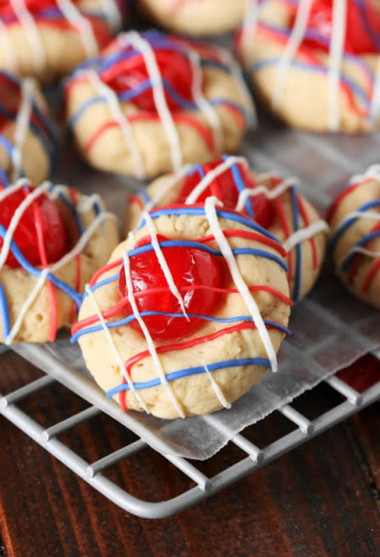 <p>The Kitchen Is My Playground</p><p>These fun and festive cookieswill pair perfectly with your 4th of July fireworks! </p><p><strong>Get the recipe: </strong><a href="http://www.thekitchenismyplayground.com/2017/06/red-white-blue-cherry-almond-cookies.html" rel="nofollow noopener" target="_blank" data-ylk="slk:Red, White & Blue Cherry Almond Cookies;elm:context_link;itc:0;sec:content-canvas" class="link "><strong>Red, White & Blue Cherry Almond Cookies</strong></a></p><p><strong>Related: <a href="https://www.yahoo.com/lifestyle/30-festive-red-white-blue-205034791.html" data-ylk="slk:30 Festive Red, White and Blue Recipes for the 4th of July;elm:context_link;itc:0;sec:content-canvas;outcm:mb_qualified_link;_E:mb_qualified_link;ct:story;" class="link  yahoo-link">30 Festive Red, White and Blue Recipes for the 4th of July</a></strong></p>