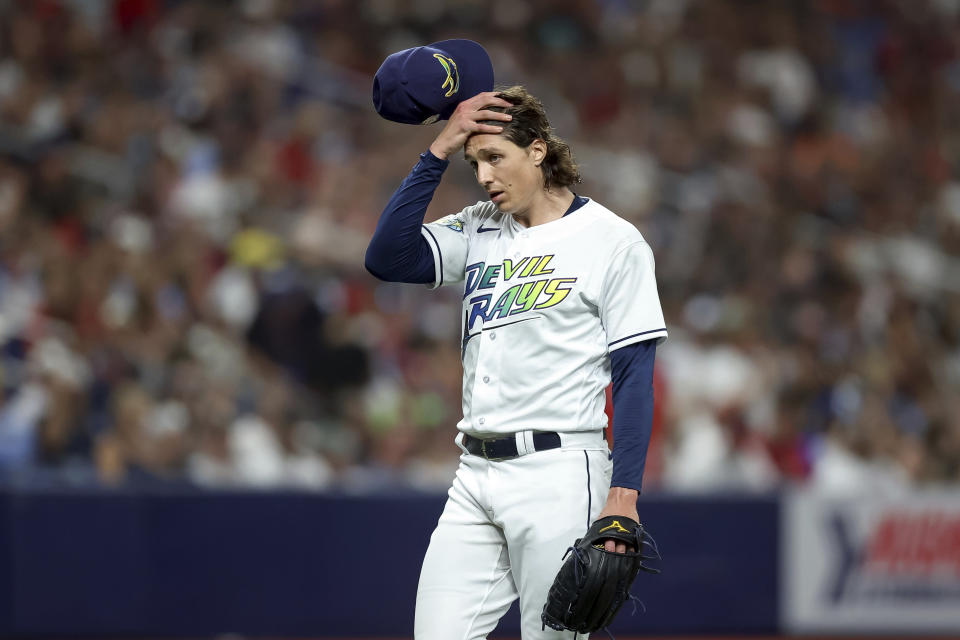 Tampa Bay Rays starting pitcher Tyler Glasnow reacts in the middle of the third inning of the team's baseball game against the Atlanta Braves on Friday, July 7, 2023, in St. Petersburg, Fla. (AP Photo/Mike Carlson)