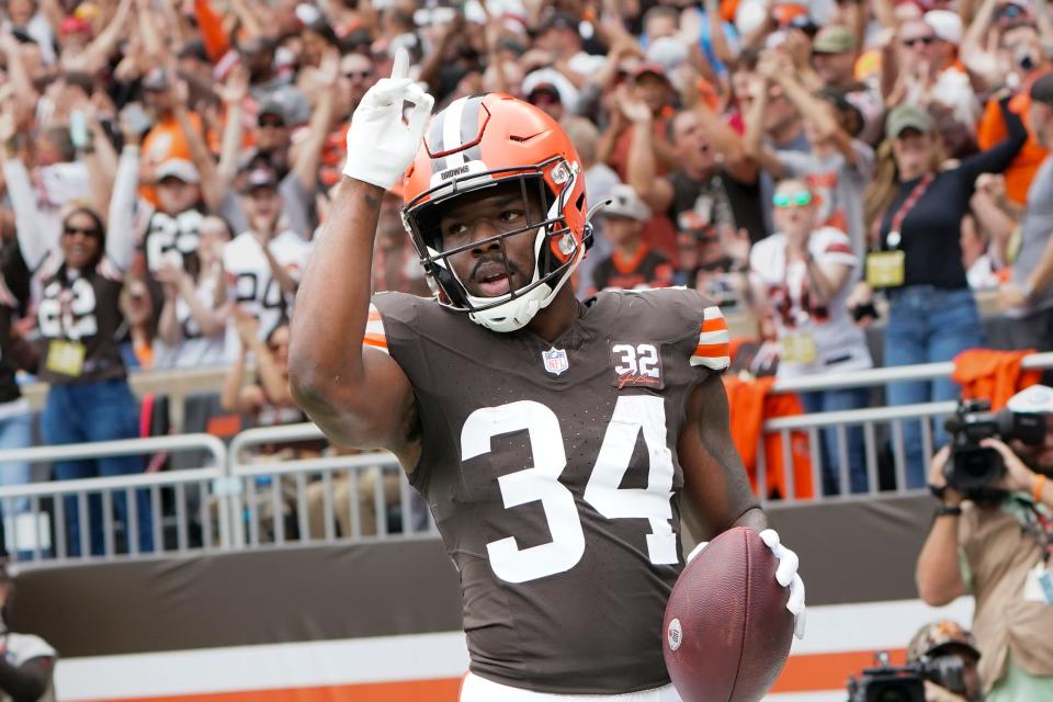 Cleveland Browns running back Jerome Ford (34) celebrates his touchdown catch against the Tennessee Titans during the first half of an NFL football game Sunday, Sept. 24, 2023, in Cleveland. (AP Photo/Sue Ogrocki)