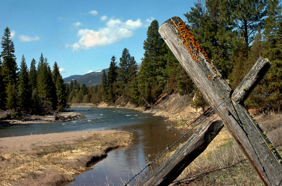 FILE - This April 26, 2006 file photo, shows Jacobsen Creek, a tributary of the North Fork of the Blackfoot River near Ovando, Mont. Authorities say a grizzly bear attacked and killed a person who was camping in the Ovando area early Tuesday, July 6, 2021. ( Jennifer Michaelis/The Missoulian via AP, FIle)