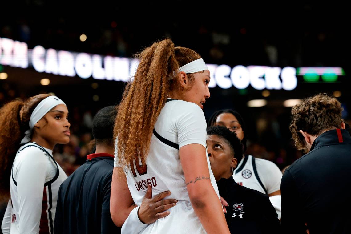 University of South Carolina Assistant Coach Jolette Law speaks with Kamilla Cardoso (10) in the aftermath of an altercation on court with LSU players during the second half of action in the SEC Tournament Championship game at Bon Secours Wellness Arena in Greenville on Sunday, Mar. 10, 2024.