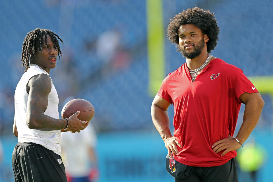 Will Kyler Murray and Marquise Brown still be teammates in Arizona this fall? (Photo by Justin Ford/Getty Images)