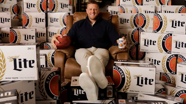 J.J. Watt surrounded by Miller Lite