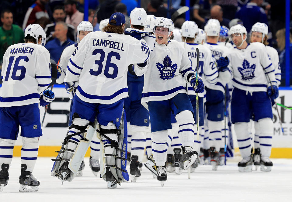 TAMPA, FLORIDA - FEBRUARY 25: Travis Dermott #23 of the Toronto Maple Leafs celebrates winning a game against the Tampa Bay Lightning at Amalie Arena on February 25, 2020 in Tampa, Florida. (Photo by Mike Ehrmann/Getty Images)