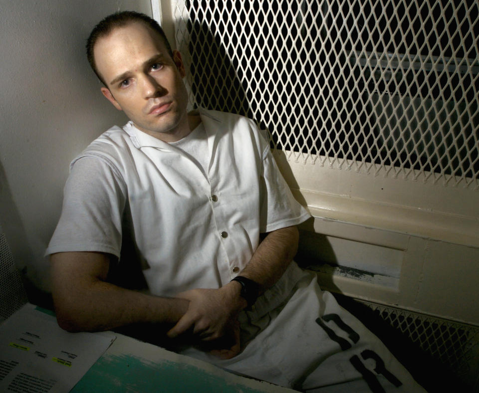 FILE - In this Dec. 3, 2003, file photo, death row inmate Randy Halprin, then 26, sits in a visitation cell at the Polunsky Unit in Livingston, Texas. Halprin, a Jewish death row inmate who was part of the "Texas 7" gang of escaped prisoners, has filed an appeal claiming the former county Judge Vickers Cunningham, who convicted him, was anti-Semitic and frequently used racial slurs. Halprin argues that Cunningham should've recused himself. (AP Photo/Brett Coomer, File)