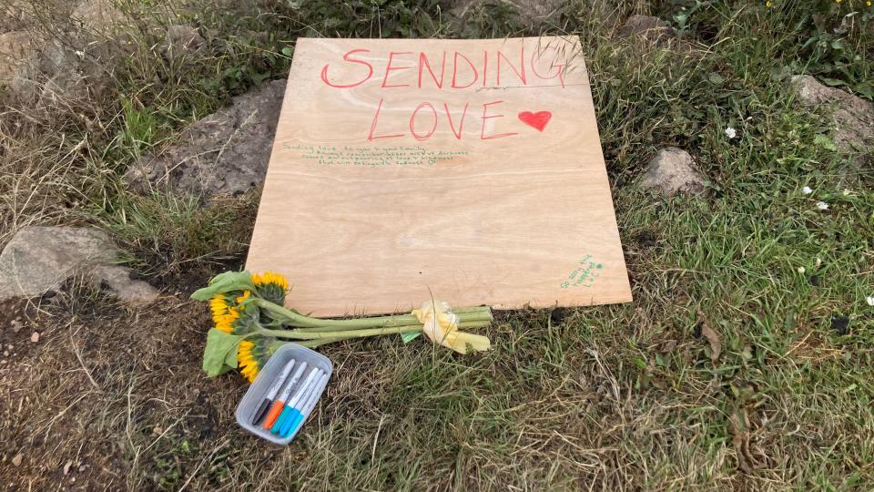 Large book labelled "sending love" and a box of pens