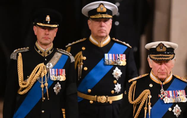 Britain's King Charles III (front R), Britain's Prince Andrew, Duke of York, and Britain's Prince Edward, Earl of Wessex arrive to mount a vigil around the coffin of Queen Elizabeth II. (Photo: DANIEL LEAL/POOL/AFP via Getty Images)