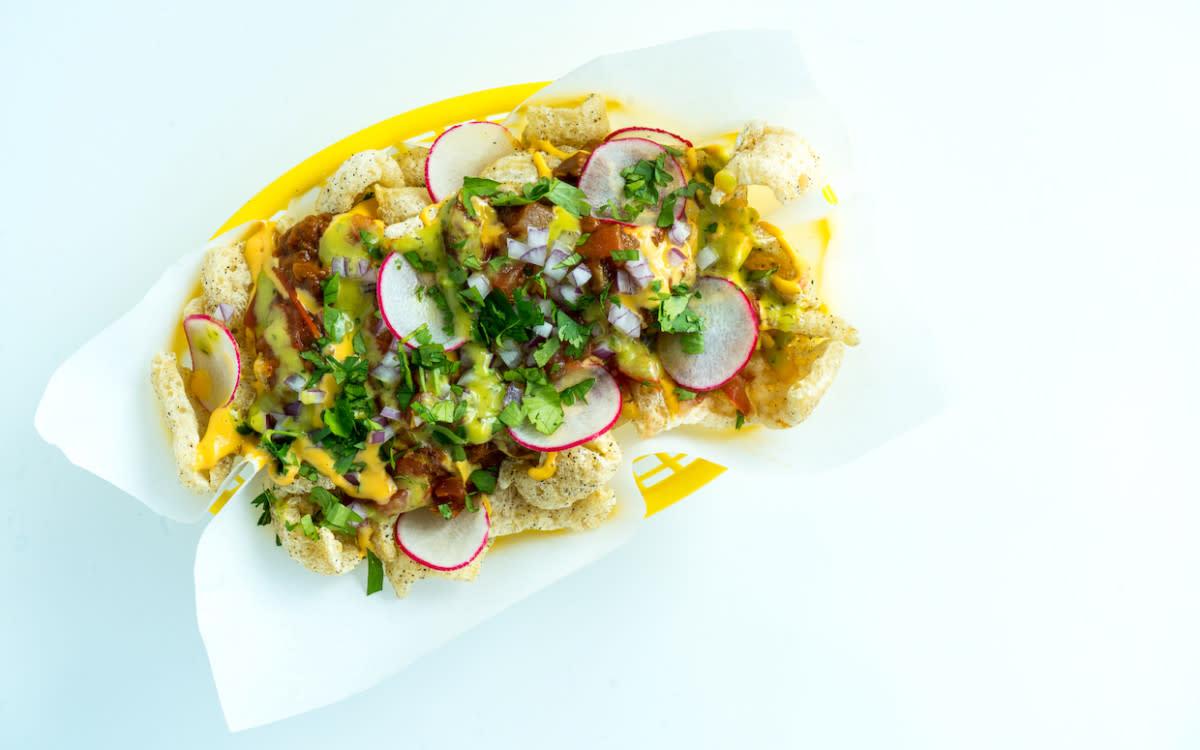 <p>Alison Ashton</p><p>Pork rings make the perfect low-carb base for some tasty nachos.</p><p><strong>Get the recipe: <a href="https://parade.com/910757/parade/the-milwaukee-bucks-love-these-chicharrones-pork-rind-nachos/" rel="nofollow noopener" target="_blank" data-ylk="slk:Chicharrones (Pork Rind) Nachos;elm:context_link;itc:0;sec:content-canvas" class="link rapid-noclick-resp">Chicharrones (Pork Rind) Nachos</a></strong></p>