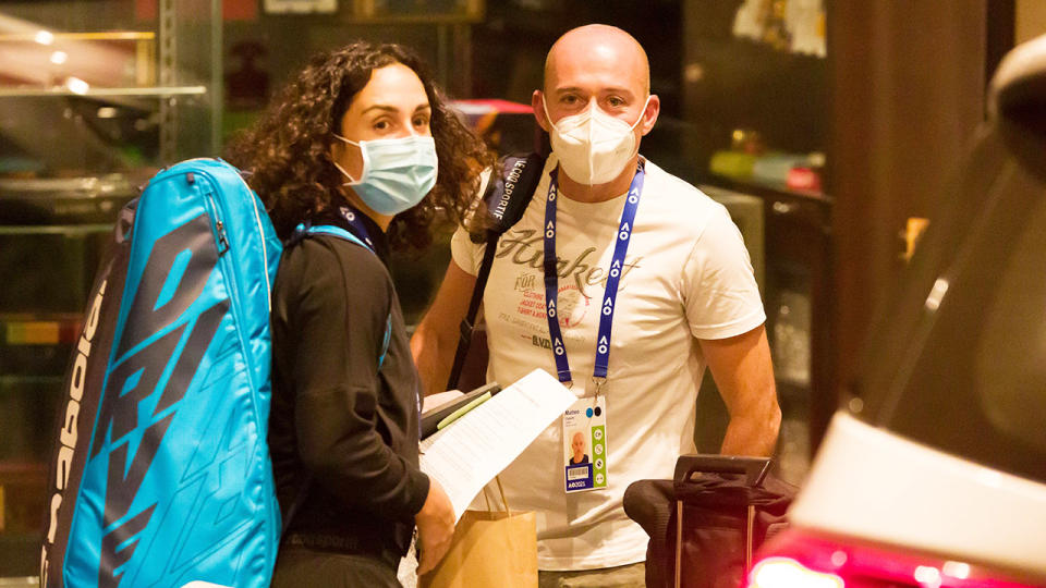 Martina Trevisan and coach Matteo Cartarsi, pictured here leaving the Hyatt Hotel in Melbourne.