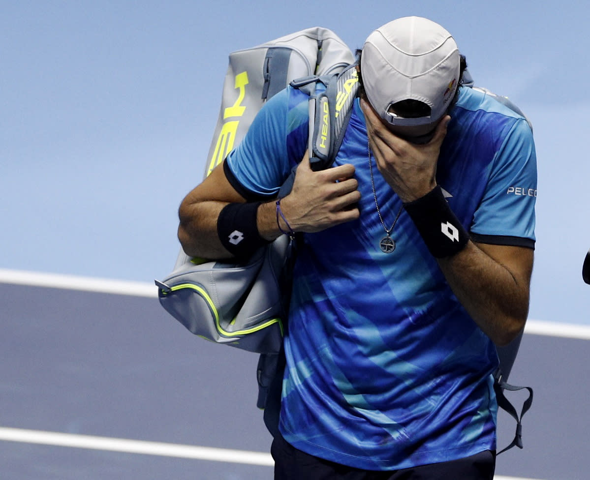 Tennis - ATP Tour Finals - Turin, Italy - November 14, 2021  Italy's Matteo Berrettini reacts after sustaining an injury and retiring from his group stage match against Germany's Alexander Zverev REUTERS/Guglielmo Mangiapane