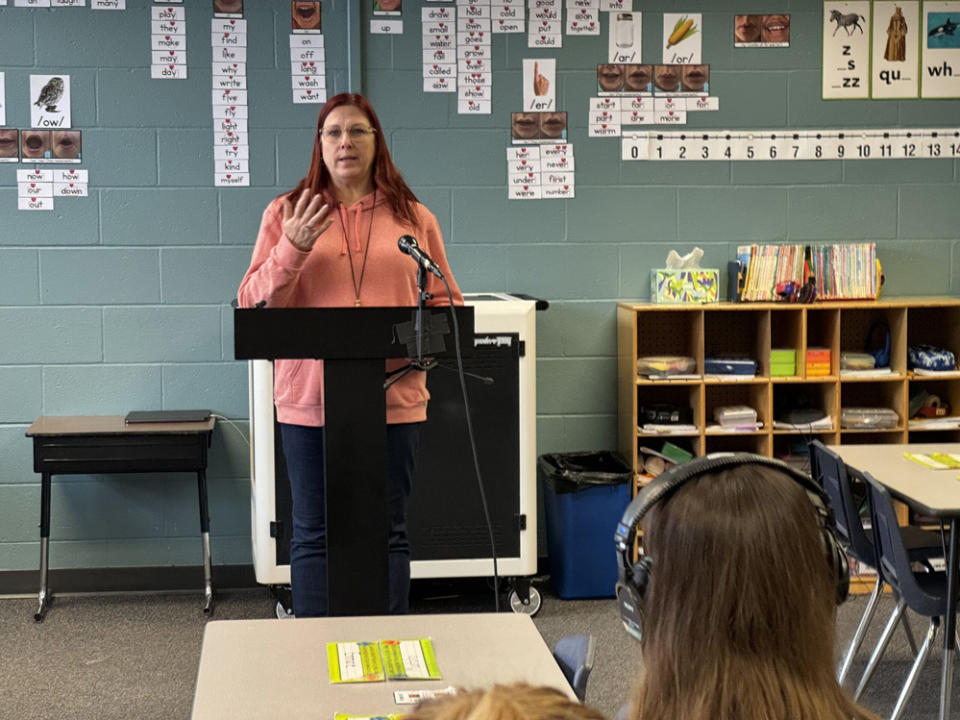 Westbrook Elementary School educational assistant Shelly Sip speaks Wednesday about the importance of financial help for schooling in her decision to move from being a para to trying to become a teacher. (Aaron Sanderford/Nebraska Examiner)