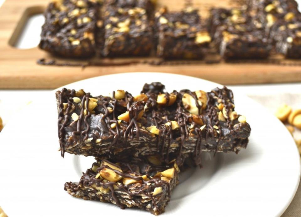 <p>These super-easy Chocolate Peanut Butter Banana Granola Bars are full of my favorite flavors! They're the perfect on-the-go snack. <a href="http://www.maebells.com/chocolate-peanut-butter-banana-granola-bar/?hc_location=ufi" rel="nofollow noopener" target="_blank" data-ylk="slk:Get the recipe here.;elm:context_link;itc:0;sec:content-canvas" class="link ">Get the recipe here.</a></p>