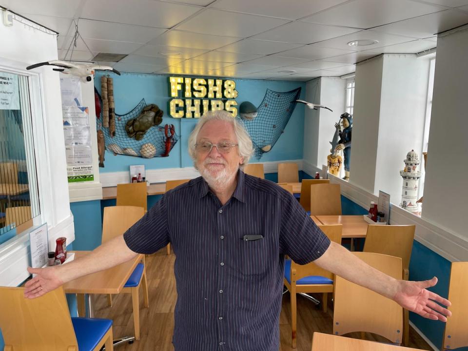 Where are the customers? Keith Johnson stands in his fish and chip shop in Brixham where he’s served no-one in first hour-and-a-half of opening on Friday lunchtime (The Independent)