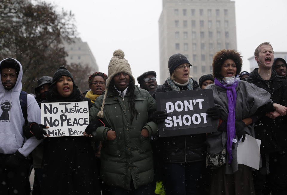 Demonstrators in November 2014 protest the killing of Michael Brown by a Ferguson, Missouri, police officer months earlier. (Photo: Joshua Lott/Getty Images)