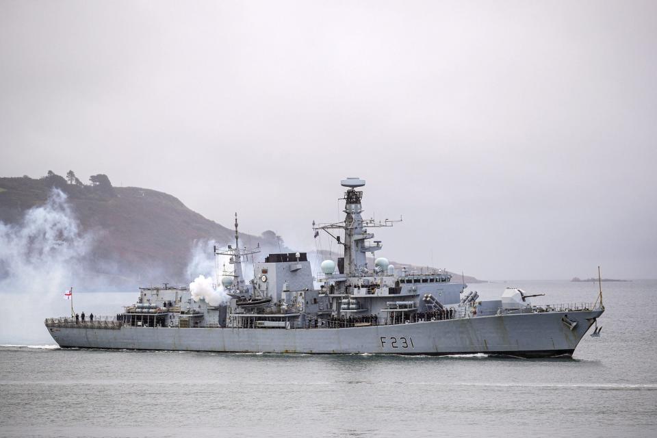 The Royal Navy frigate HMS <em>Argyll</em> firing a salute. <em>Crown Copyright</em>