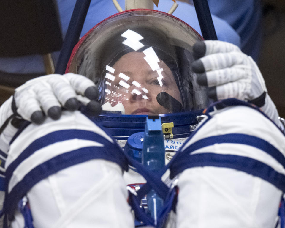 Expedition 71 NASA astronaut Tracy Dyson has her Russian Sokol suit pressure checked as she and Roscosmos cosmonaut Oleg Novitskiy and Belarus spaceflight participant Marina Vasilevskaya prepare for their Soyuz launch to the International Space Station Thursday, March 21, 2024 in Baikonur, Kazakhstan. (Bill Ingalls/NASA via AP)