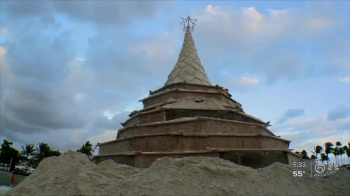 Sculptors shape Sandi Holiday Tree with 700 tons of sand in West Palm