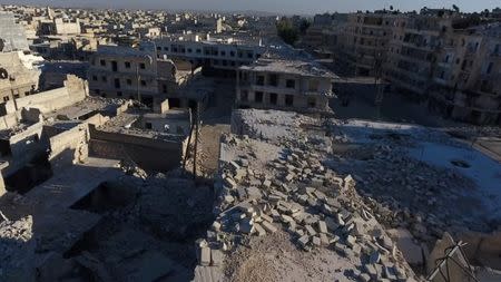 A still image taken on September 27, 2016 from a drone footage obtained by Reuters shows damaged buildings in a rebel-held area of Aleppo, Syria. Handout via Reuters TV