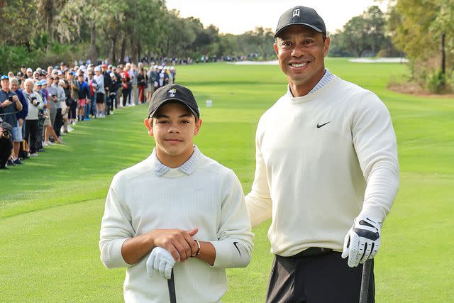 David Cannon/Getty Images Tiger Woods and his son Charlie pose at the 2022 PNC Championship