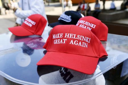 Commemorative caps are displayed during a support demonstration ahead of meeting between the U.S. President Donald Trump and Russian President Vladimir Putin in Helsinki, Finland July 15, 2018. Lehtikuva/Martti Kainulainen via REUTERS