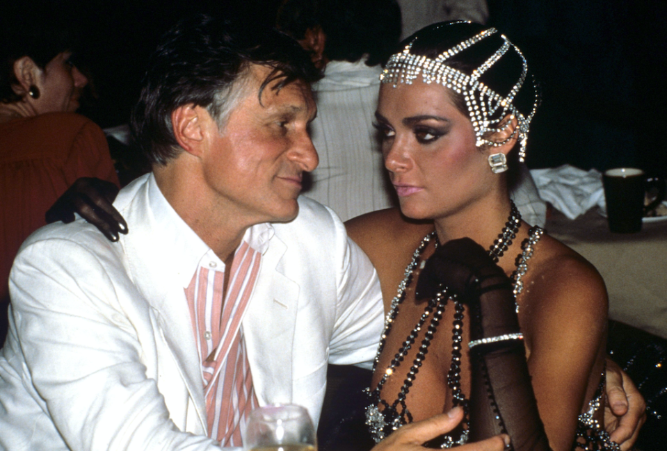 Hugh Hefner and girlfriend Carrie Leigh in 1986