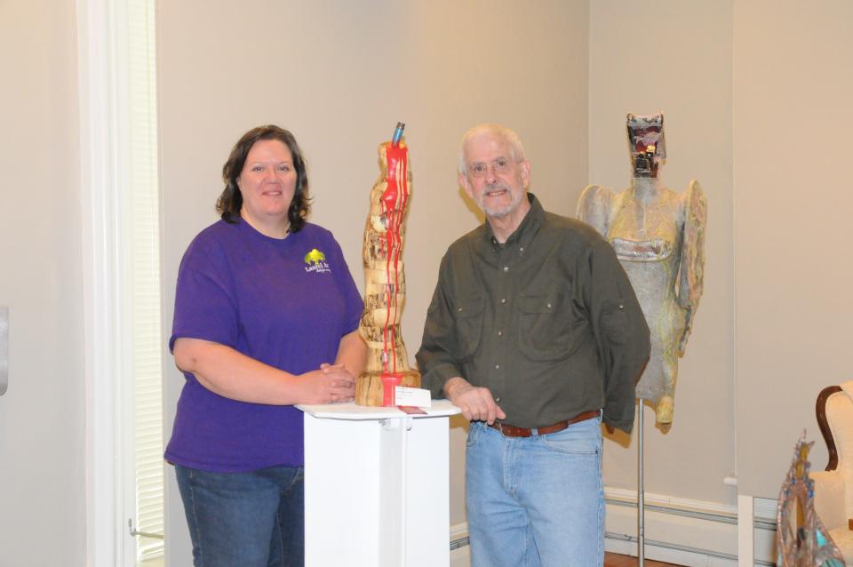 Artists Alison Leer and David Greene have the the piece, "The Sadness of War," between them. The piece that garnered second place in the show was created by Greene who used spalted Maple and acrylic. Leer was coordinator of the exhibit at Laurel Arts in Somerset Borough.