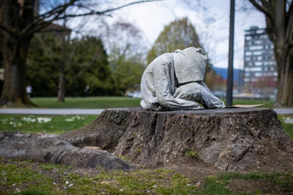 A statue commemorating people who have died to drug overdoses is pictured at Seaforth Peace Park in Vancouver, British Columbia on Wednesday, April 13, 2022.