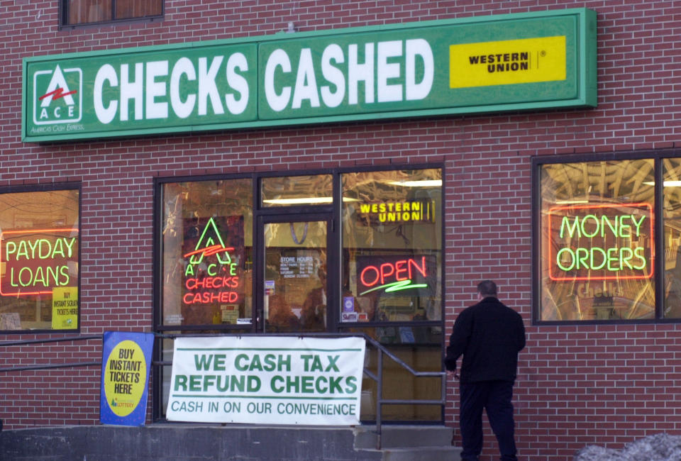 Fringe check-cashing businesses&nbsp;generate about $790 million in fees each year. (Photo: Portland Press Herald via Getty Images)