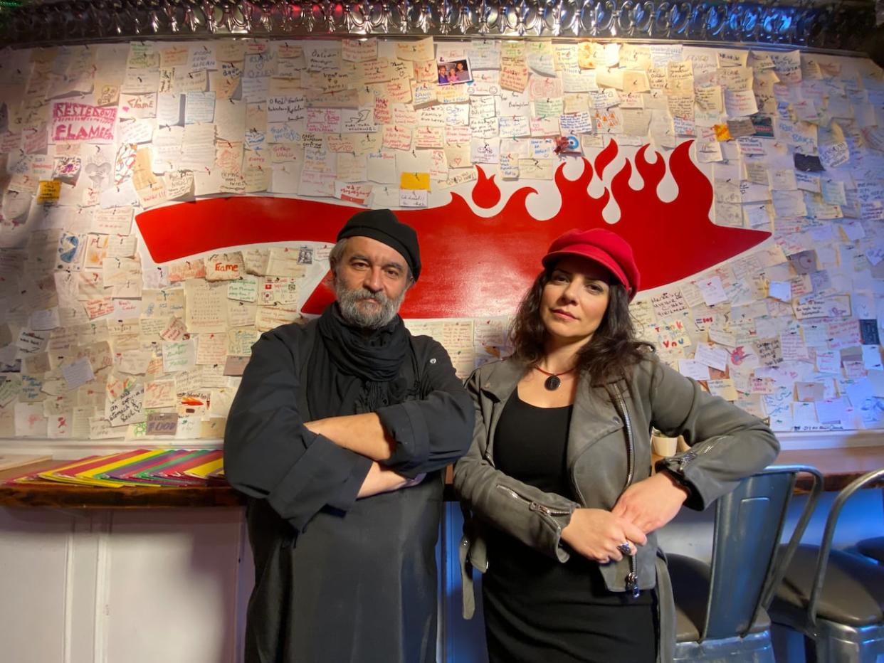 Irem Sacakli and her husband Serhat Sacildi, co-owners of restaurant and design store Flame Food and Design, say they won't be able to pay back the $40,000 in federal loans they took during the COVID-19 pandemic by the approaching deadline. (Grant Linton/CBC  - image credit)