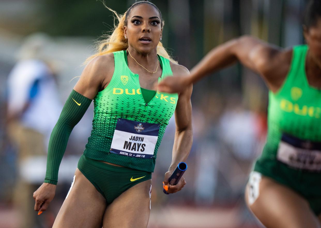 Oregon's Jadyn Mays runs the second leg in the 400-meter relay semifinals at the 2023 NCAA outdoor track and field championships, June 8, 2023 at Mike A. Myers Stadium in Austin.