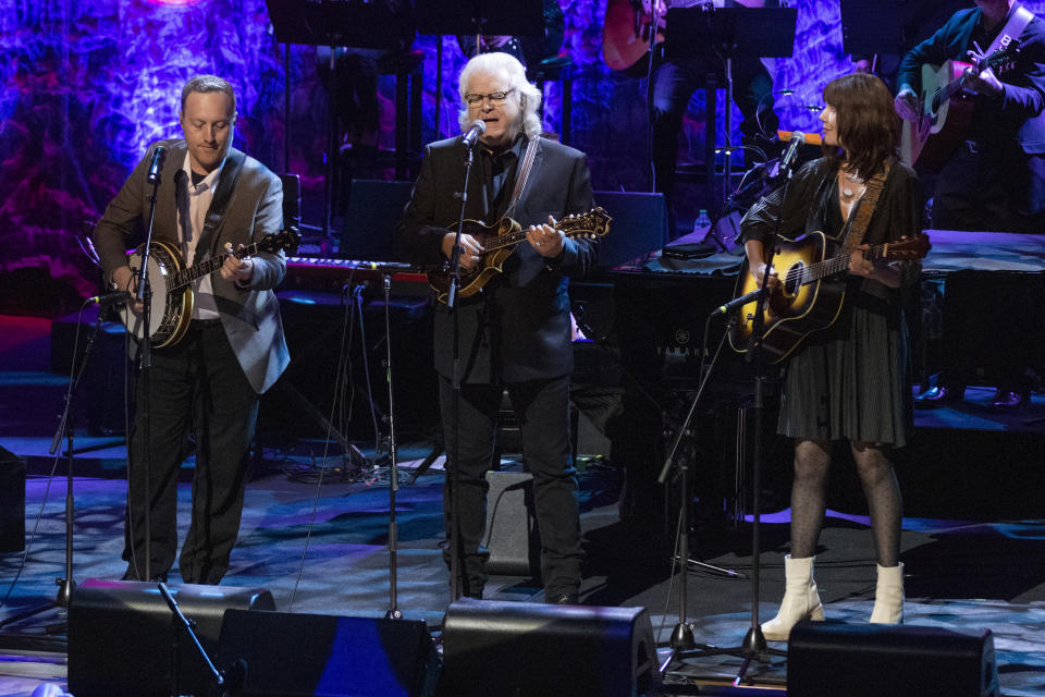 Ricky Skaggs, center, performs with Molly Tuttle, right, and Justin Moses during the Country Music Hall of Fame Medallion Ceremony on Sunday, Oct. 16, 2022, at the Country Music Hall of Fame in Nashville, Tenn. (Photo by Wade Payne/Invision/AP)