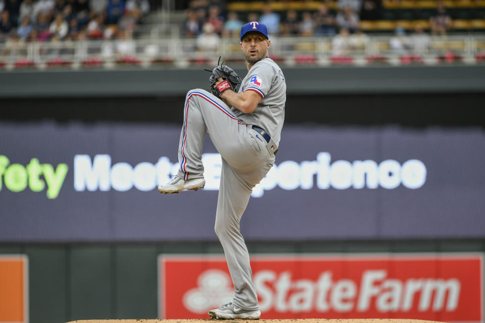 Texas Rangers pitcher Max Scherzer winds up during the first inning of the team's baseball game against the Minnesota Twins, Saturday, August 26, 2023, in Minneapolis. (AP Photo/Craig Lassig)