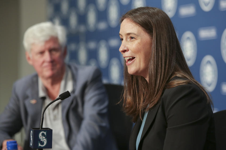 Catie Griggs is introduced as the Seattle Mariners new president of business operations by John Stanton, the team's chairman and managing partner, during a baseball a press conference on Wednesday, July 28, 2021, (AP Photo/Jason Redmond)