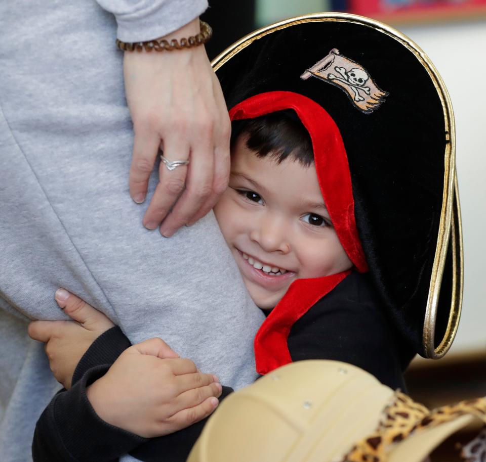 Jeziel Rivera smiles while participating in La Escuelita on Feb. 1 in Green Bay.