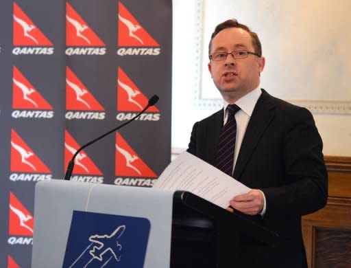 Qantas Airways CEO Alan Joyce announces the end of a lucrative marketing deal with Tourism Australia after claiming its boss was leading a consortium trying to unseat the airline's management and buy out the company, in Sydney on November 28, 2012