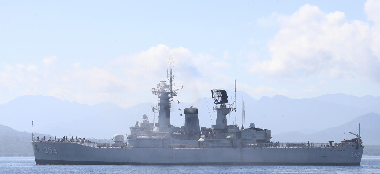 Indonesian navy ship Oswad Siahaan sails to join the search for submarine KRI Nanggala that went missing while participating in a training exercise, off Banyuwangi, East Java, Indonesia, Saturday, April 24, 2021. The oxygen supply for the 53 crew members of the Indonesian submarine missing in waters off Bali is believed to have run out early Saturday with no sign of the vessel while the search resumed, bolstered by the arrival of a sonar-equipped Australian warship. (AP Photo/Achmad Ibrahim)