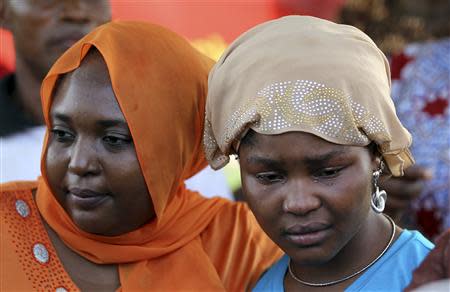 A protester cries during a sit-in rally for the abducted schoolgirls, at the Unity Fountain in Abuja May 15, 2014. REUTERS/Afolabi Sotunde