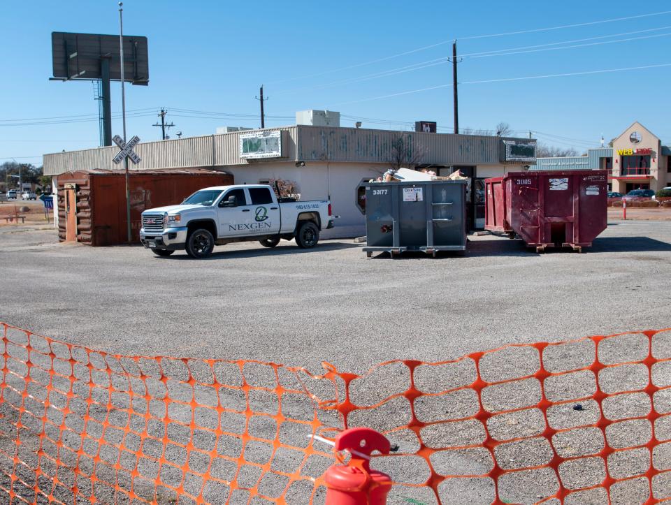 Construction crews worked Thursday to turn the former Harvest Drug location on McNiel Avenue into a new Grandy's Restaurant.