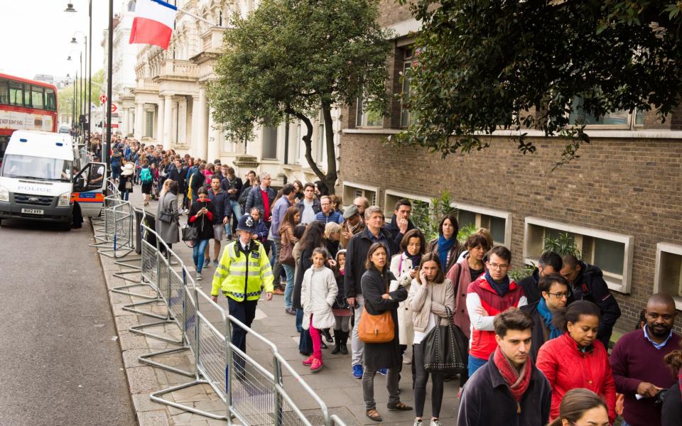 French citizens in the UK queue to vote in the French election at the Lycee Francais Charles de Gaulle, South Kensington - Credit: Fiona Hanson