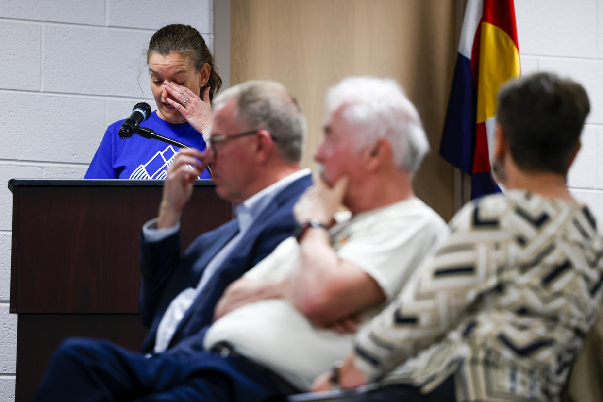 Woodland Park Middle School teacher and parent Amber Hemingson delivers an emotional speech to the Woodland Park Board of Education during their meeting on April 12, 2023 in Woodland Park, Colo. (Michael Ciaglo for NBC News)